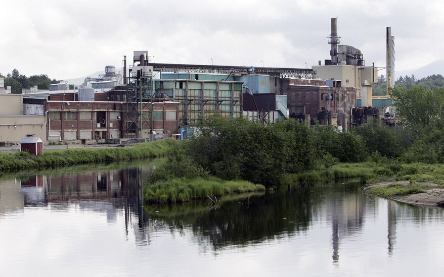 FILE -The closed and shut down paper mill is seen in Groveton, N.H., in this June 17, 2008 file photo. An energy development company has made a pitch to the town in February of 2014, to turn the former paper plant into a transfer station converting natural gas into liquefied natural gas. (AP Photo/Jim Cole, file)