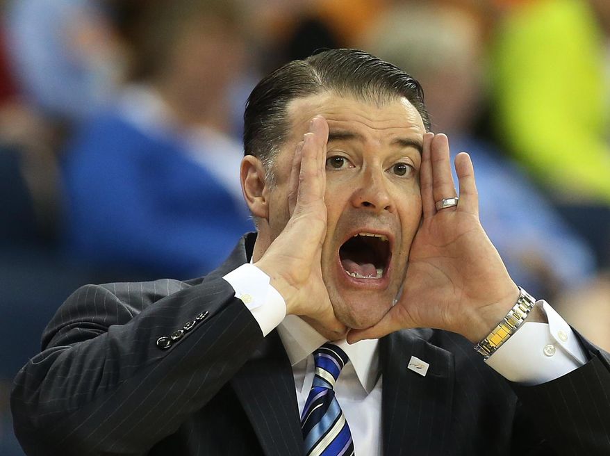 Kentucky coach Matthew Mitchell yells to his players from the sideline in the first  half an NCAA college basketball game in the semifinals of the Southeastern Conference women&#x27;s basketball tournament against South Carolina  Saturday, March 8, 2014, in Duluth, Ga. (AP Photo/Jason Getz)