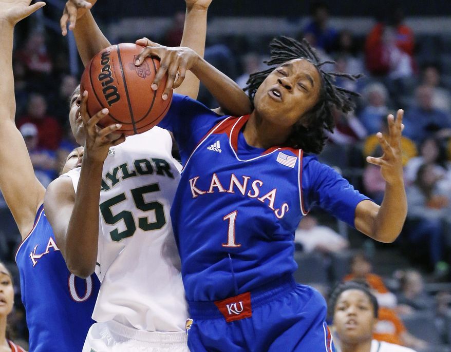 Kansas guard Lamaria Cole (1) and Baylor point Khadijiah Cave (55) fight for a rebound in the second half of an NCAA college basketball game in the quarterfinals of the Big 12 Conference women&#x27;s college tournament in Oklahoma City, Saturday, March 8, 2014. Baylor won 81-47. (AP Photo/Sue Ogrocki)
