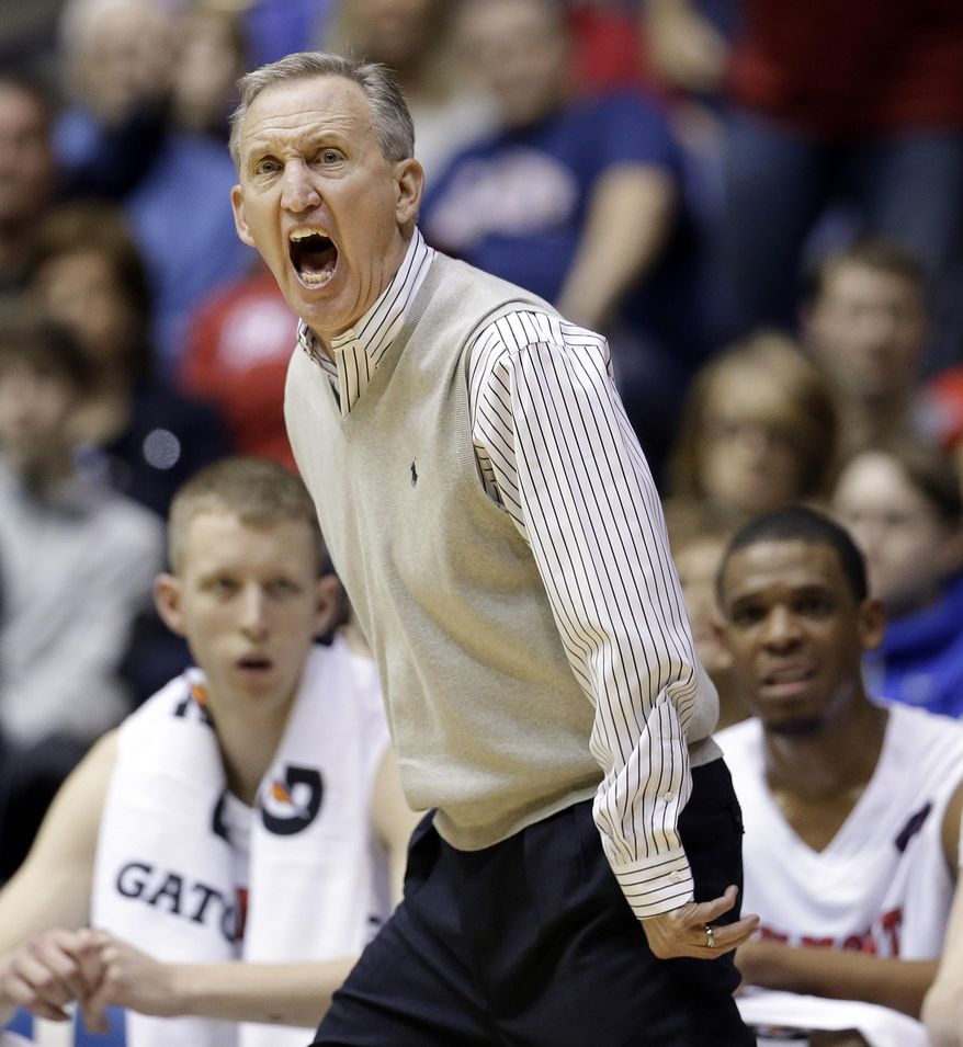 Belmont head coach Rick Byrd yells to his team during the first half against Eastern Kentucky in an NCAA college basketball game for the championship of the Ohio Valley Conference men's tournament, Saturday, March 8, 2014, in Nashville, Tenn. (AP Photo/Mark Humphrey)