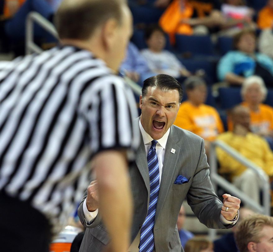Kentucky  head coach Matthew Mitchell yells at an official in the first half of an NCAA college basketball game against Tennessee in the finals of the Southeastern Conference women&#x27;s tournament Sunday, March 9, 2014, in Duluth, Ga. (AP Photo/Jason Getz)