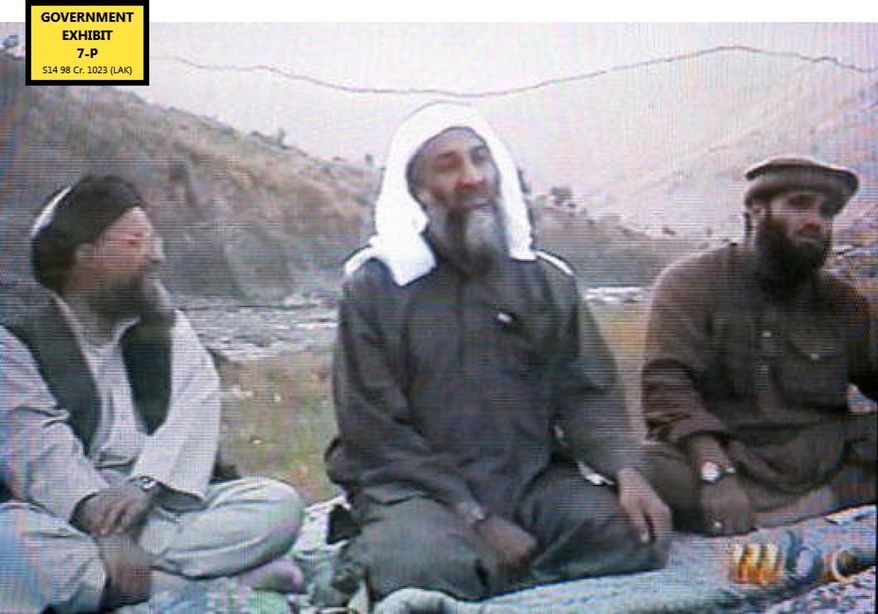 In this undated photo provided by the United States Attorney’s Office for the Southern District of New York,  defendant Suliman Abu Ghayth, right, is seated with  al Qaida founder Osama Bin Laden, center, and Bin Laden’s deputy, Ayman al Zawahiri, in Afghanistan. Suliman Abu Ghayth, is being tried in New York, charged with plotting to kill Americans by being a motivational speaker at al Qaida training camps before the Sept. 11 attacks and as a spokesman for the terror group afterward when it sought to recruit more militants to its cause. (AP Photo/U.S. Attorney’s Office for the Southern District of New York)