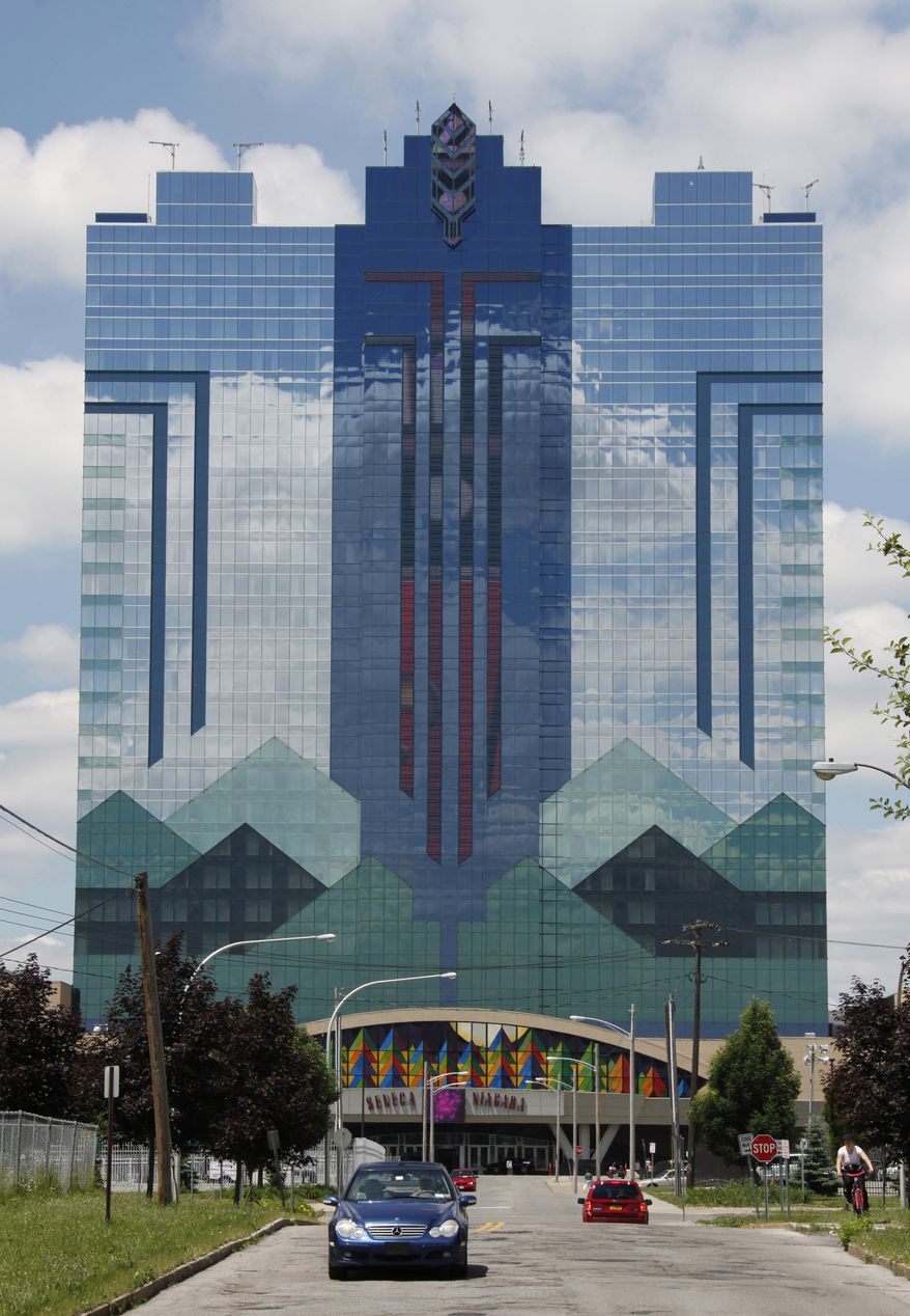 FILE--In this June 11, 2010 file photo, the Seneca Niagara Casino is shown in Niagara Falls, N.Y. As New York state prepares to take bids for its first non-Indian casinos, tribes seeking to hold their ground in the gambling landscape have been upgrading and expanding existing facilities and exploring new ones. (AP Photo/David Duprey,File)