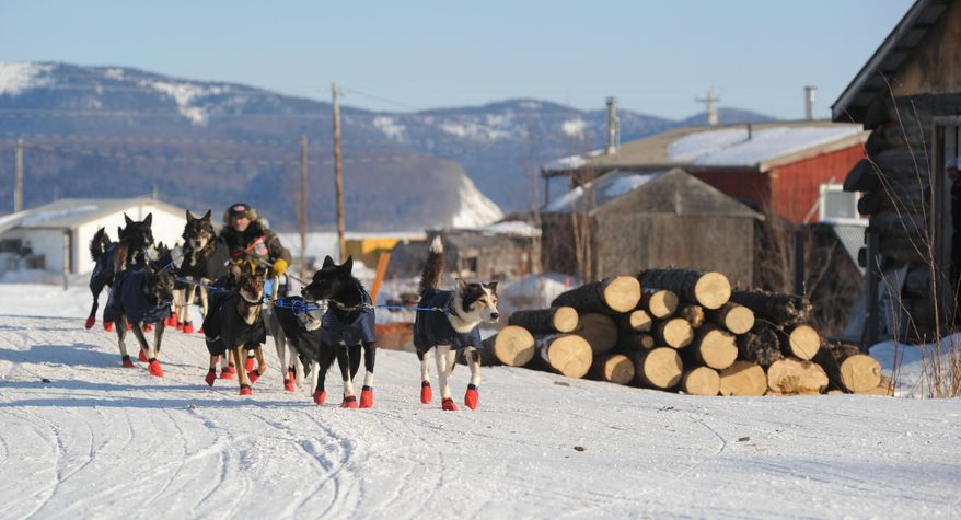 Robert Sorlie drives his team out of the Yukon River village of Kaltag during the 2014 Iditarod Trail Sled Dog Race on Saturday, March 8, 2014. (AP Photo/The Anchorage Daily News, Bob Hallinen)