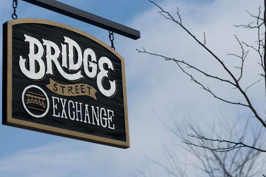 Four new businesses have opened in downtown Linden over the past year, including the Bridge Street Exchange, a men's clothing store specializing in men's wedding bands, which was open for business on Wednesday, Feb. 19, 2014, in downtown Linden, Mich. (AP Photo/The Flint Journal, Katie McLean) LOCAL TV OUT; LOCAL INTERNET OUT