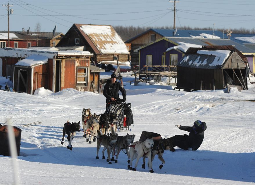 Dallas Seavey leaves the Yukon River village of Kaltag during the 2014 Iditarod Trail Sled Dog Race on Saturday, March 8, 2014. (AP Photo/The Anchorage Daily News, Bob Hallinen)