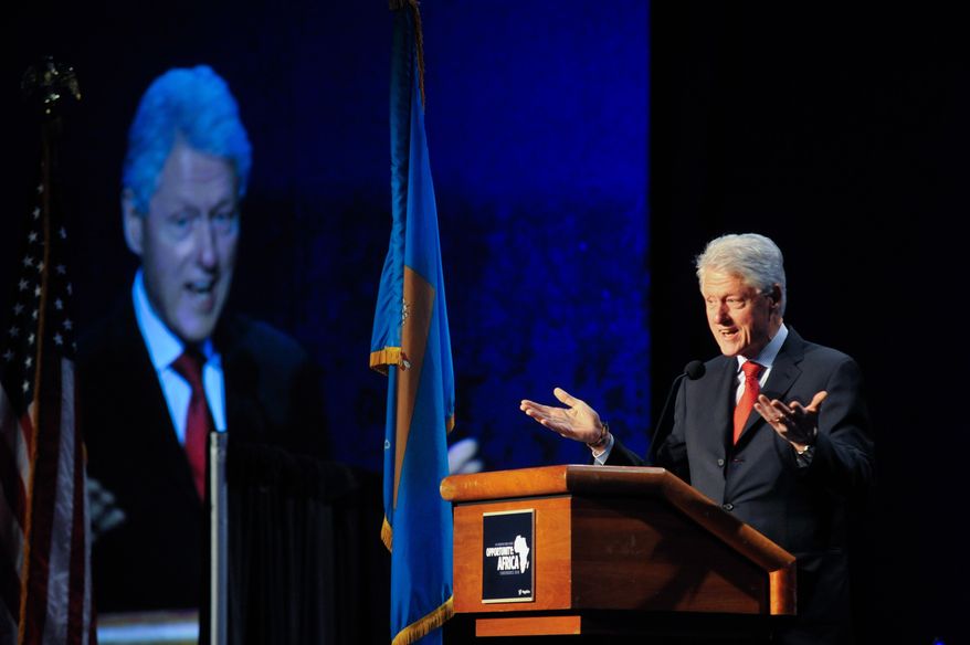 Former President Bill Clinton delivers remarks at an annual conference on Africa in Wilmington, Del., Monday, March 10, 2014. The conference brought together businesses, faith communities and individuals in Delaware with experts on Africa to discuss trade opportunities and issues such as human rights, sustainable development and global health. (AP Photo/Emily Varisco)