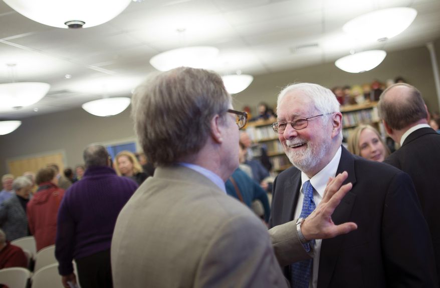 The Rev. Thomas Ogletree smiles during a conversation following a news conference announcing that a case against him for breaking church law by officiating his son's same-sex marriage had been dropped, Monday, March 10, 2014, in White Plains, N.Y. Bishop Martin McLee, who announced the decision, called on church officials to stop prosecuting other pastors for marrying same-sex couples. McLee, who leads the church's New York district said he would cease church trials over the issue in his district and would organize a broad discussion about the church's internal divisions over gay relationships. (AP Photo/John Minchillo)