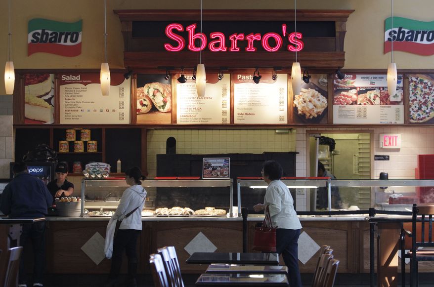 **FILE** Customers are served at Sbarro restaurant in San Jose, Calif., on April 4, 2011. (Associated Press)