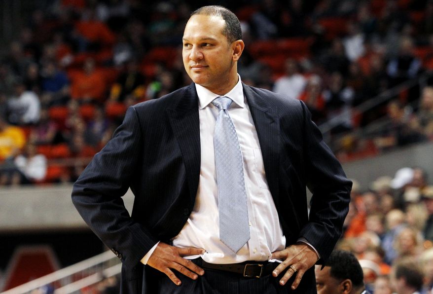 FILE - In this Jan. 11, 2014, file photo, Auburn coach Tony Barbee reacts to a call during the first half of an NCAA college basketball game against Missouri in Auburn, Ala. Barbee's boss, athletic director Jay Jacobs, said the Tigers needed to show significant improvement this season. Going into the SEC tournament, Auburn's record is better but the team is still near the bottom of the league and Barbee's future remains in doubt. (AP Photo/Butch Dill, File)