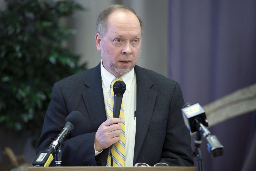 Methodist Rev. Timothy Riss, counsel for the church, speaks to the media during a news conference following the announcement that a case against Rev. Thomas Ogletree for breaking church law by officiating his son's same-sex marriage had been dropped, Monday, March 10, 2014, in White Plains, N.Y. Bishop Martin McLee, who announced the decision, called on church officials to stop prosecuting other pastors for marrying same-sex couples. McLee, who leads the church's New York district said he would cease church trials over the issue in his district and would organize a broad discussion about the church's internal divisions over gay relationships. (AP Photo/John Minchillo)