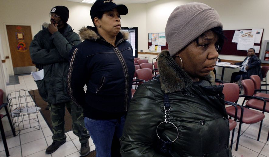 People wait in line at the State of Michigan Wayne County Family Independence Agency office in Detroit for welfare assistance. After a federal judge in Florida struck down the state&#39;s drug test requirement in December, some states are pursuing new strategies to link drug testing to welfare. (Associated Press)
