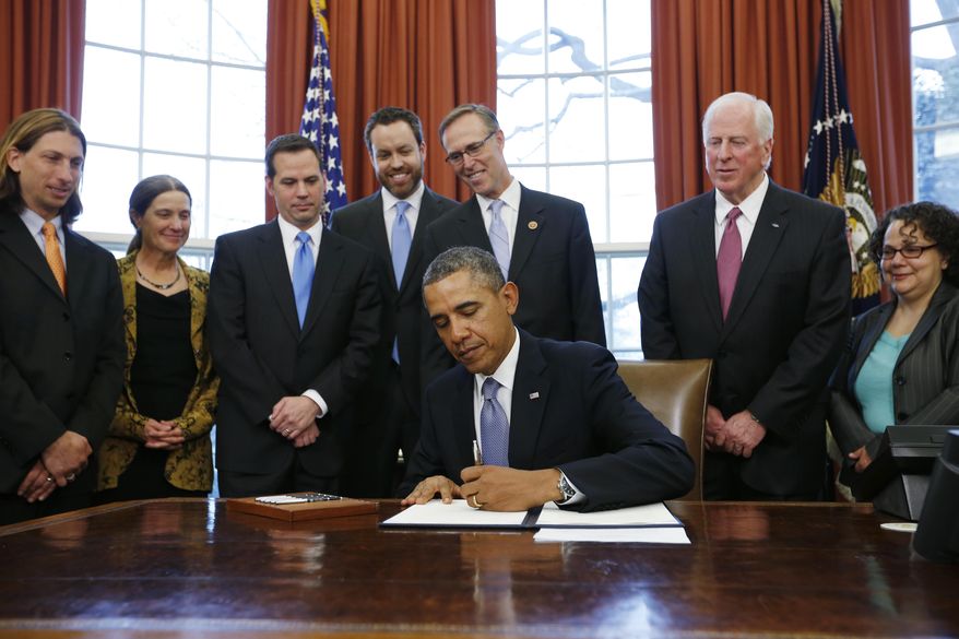 President Barack Obama signs a document proclaiming the Point Arena-Stornetta Public Lands as part of the California Coastal National Monument during a signing ceremony in the Oval Office of the White House in Washington, Tuesday, March 11, 2014. From left are: Scott Schneider, President and CEO, Visit Mendocino County Inc.; Leslie Dahlhoff, Former Mayor, Point Arena; Michael Boots, Acting Chair of the Council on Environmental Quality; Neil Kornze, Principal Deputy Director, Bureau of Land Management; Rep. Jared Huffman, D-Calif.; Rep. Mike Thompson, D-Calif.; Nancy Sutley, Former Chair of the Council on Environmental Quality. (AP Photo/Charles Dharapak)