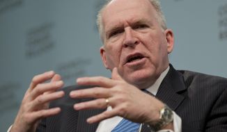 CIA Director John O. Brennan speaks at the Council on Foreign Relations, Tuesday, March 11, 2014, in Washington. The head of the Senate Intelligence Committee said Tuesday the CIA improperly searched a stand-alone computer network established for Congress in its investigation of allegations of CIA abuse in a Bush-era detention and interrogation program and the agency&#39;s own inspector general has referred the matter to the Justice Department for possible legal action. (AP Photo/Carolyn Kaster)