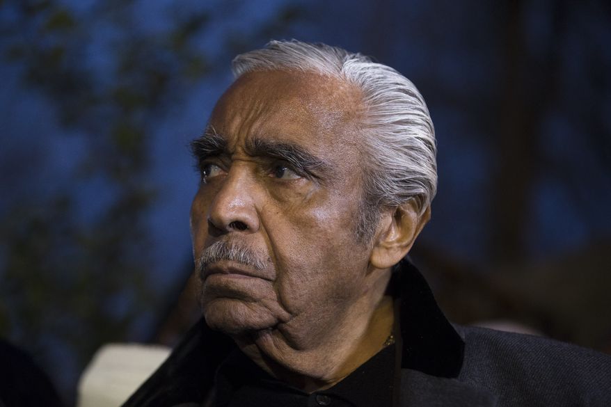 U.S. Congressman Charles Rangel attends a news conference at the scene of a Metro-North passenger train derailment in the Bronx borough of New York, Sunday, Dec. 1, 2013. The train derailed on a curved section of track in the Bronx on Sunday morning, coming to rest just inches from the water and causing multiple fatalities and dozens of injuries, authorities said. Metropolitan Transportation Authority police say the train derailed near the Spuyten Duyvil station. (AP Photo/John Minchillo)