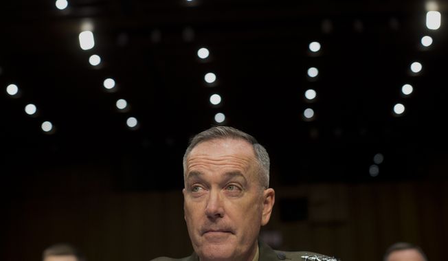 Marine Gen. Joseph F. Dunford, Jr., Commander, International Security Assistance Force, listens on Capitol Hill in Washington, Wednesday, March 12, 2014, while testifying before the Senate Armed Services Committee on the situation in Afghanistan. President Barack Obama has threatened to withdraw all American forces from Afghanistan if a new security agreement is not signed by the end of the year, but there is no legal reason the U.S. has to resort to the &quot;zero option,&quot; as administration officials have repeatedly claimed.  (AP Photo/Carolyn Kaster)