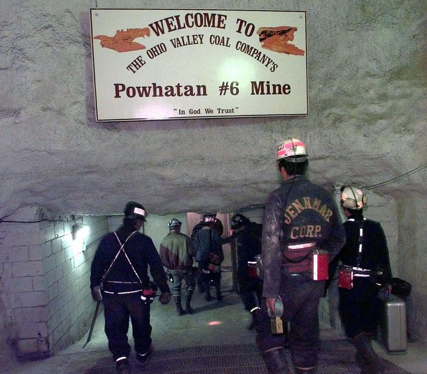 FILE - In this Oct. 5, 2000 file photo, Ohio Valley Coal Mine employees and safety inspectors enter the Powhatan No. 6 coal mine near Alledonia, Ohio. Eighteen coal facilities in Ohio, including Powhatam No. 6, are operating with expired pollution-discharge permits under an agency where allegations of coal-industry influence arose during a personnel flap last year, an Associated Press review has found. (AP Photo/Jay LaPrete, File)
