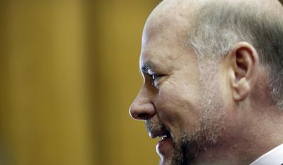 House Speaker Brian Bosma, R-Indianapolis, talks with the media in the mid-afternoon of the final day of the 2014 legislative session at the Statehouse in Indianapolis, Thursday, March 13, 2014. (AP Photo/AJ Mast)