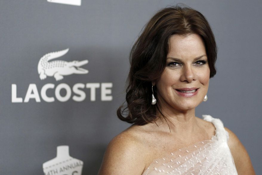 FILE - In this Feb. 21, 2012 file photo, actress Marcia Gay Harden arrives at the 14th Annual Costume Designers Guild Awards at the The Beverly Hilton hotel in Beverly Hills, Calif. Since getting cast in the film adaptation of "Fifty Shades of Grey," Jamie Dornan, who plays the S&M loving, billionaire Christian Grey, has largely stayed out of the public eye. This aura of mystery surrounding Dornan is a good thing, according to Gay Harden, who plays his mother in the movie. (AP Photo/Matt Sayles, file)