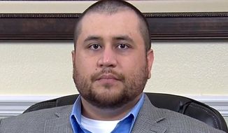 This image taken from a video released by attorney Howard Iken on Wednesday, March 12, 2014, shows George Zimmerman, the former neighborhood watch volunteer who was acquitted of murder for fatally shooting Trayvon Martin, during an interview in Orlando, Fla., on Friday, March 7, 2014. The video was made by Iken who is representing Zimmerman in his divorce. In the video, Zimmerman says he’s trying to be a good person and he thinks he can help others after what he has gone through. (AP Photo/Howard Iken)