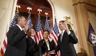 Newly elected Republican Rep. David Jolly of Florida, right, poses during a ceremonial swearing-in with House Speaker John Boehner of Ohio, left, on Capitol Hill in Washington, Thursday, March 13, 2014. He is joined by his mother Judy Jolly and father Lawson Jolly at center. Earlier this week, Jolly edged out Democrat Alex Sink in a special election that Republicans cast as a referendum on President Barack Obama and his unpopular health care law. The Tampa-area district had been considered a toss-up. Jolly fills the open seat that had been held for decades by Republican C.W. Bill Young who died in October. The 41-year-old Jolly has long experience in Washington, first as an aide to Young and then as a lobbyist. Republicans now hold 233 seats in the House to the Democrats’ 199. There are three vacancies. (AP Photo/J. Scott Applewhite)