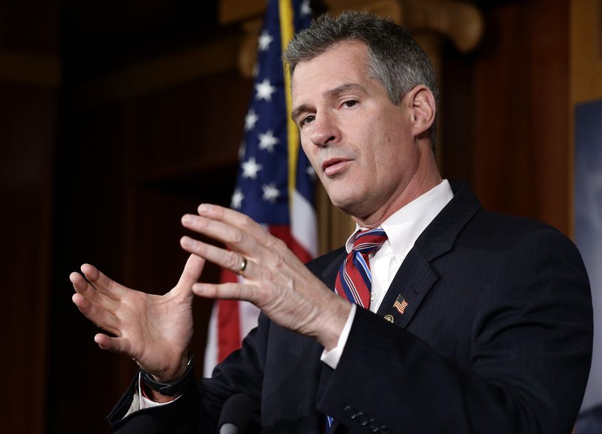 ** FILE ** In this Nov. 13, 2012, file photo, then-Massachusetts Sen. Scott Brown speaks on Capitol Hill in Washington. (AP Photo/Alex Brandon, File)