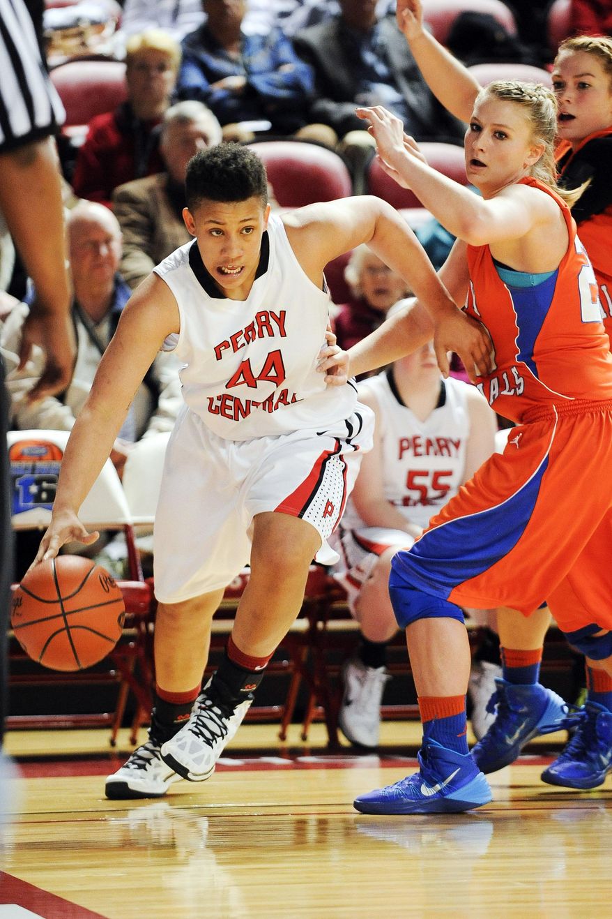 Perry County Central's Kayla Rankin (44) drives past Marshall County's Allie York, right, during a high school basketball game in the first round of the KHSAA Girls' Sweet 16 in Bowling Green, Ky., Thursday, March, 13, 2014. Marshall County won 54-38. (AP Photo/The Daily News, Alex Slitz)