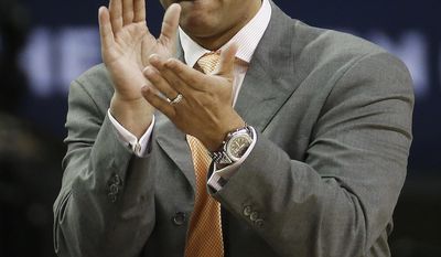 Auburn head coach Tony Barbee watches play against South Carolina during the first half in a first round Southeastern Conference tournament game, Wednesday, March 12, 2014, in Atlanta. (AP Photo/John Bazemore)
