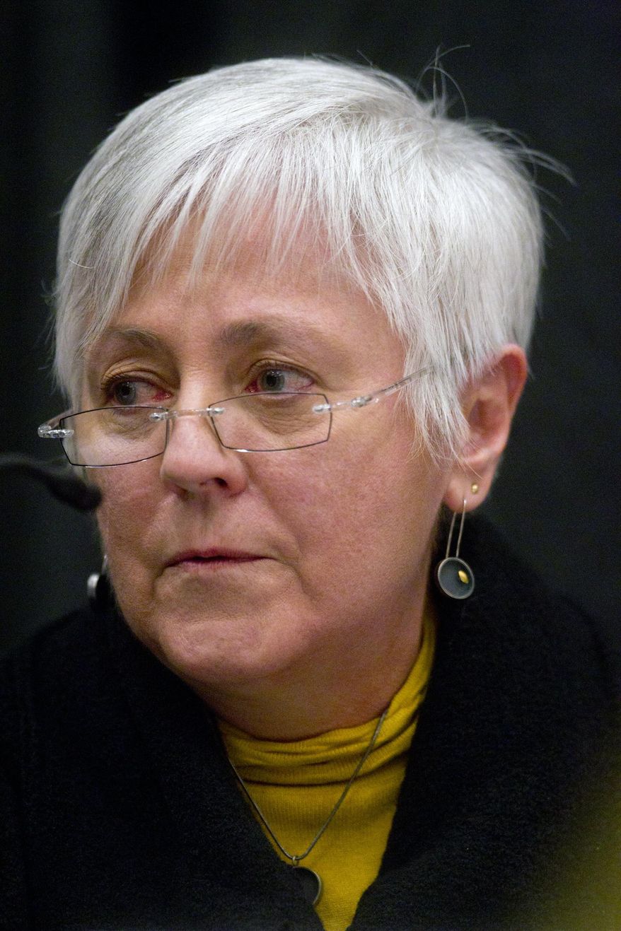 In this Feb. 27, 2014 file photo University of Iowa President Sally Mason talks with students during a forum on campus sexual assaults at the school in Iowa City, Iowa. Under fire for an earlier statement _ that ending sexual assault was probably unrealistic “just given human nature and that’s unfortunate” _ Mason apologized and held the forum but was still criticized by students and the administration. Her predicament illustrates the tremendous pressure facing administrators _ from well-organized student activists, boards concerned about campus safety and an increasingly active federal government. (AP Photo/Iowa City Press-Citizen, Benjamin Roberts, File)