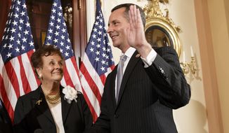 Newly elected Republican Rep. David Jolly of Florida, right, poses for a ceremonial swearing-in with his mother Judy Jolly and House Speaker John Boehner of Ohio, on  Capitol Hill in Washington, Thursday, March 13, 2014. Earlier this week, Jolly edged out Democrat Alex Sink in a special election that Republicans cast as a referendum on President Barack Obama and his unpopular health care law. The Tampa-area district had been considered a toss-up. Jolly fills the open seat that had been held for decades by Republican C.W. Bill Young who died in October. The 41-year-old Jolly has long experience in Washington, first as an aide to Young and then as a lobbyist. Republicans now hold 233 seats in the House to the Democrats&amp;#8217; 199. There are three vacancies. (AP Photo/J. Scott Applewhite)
