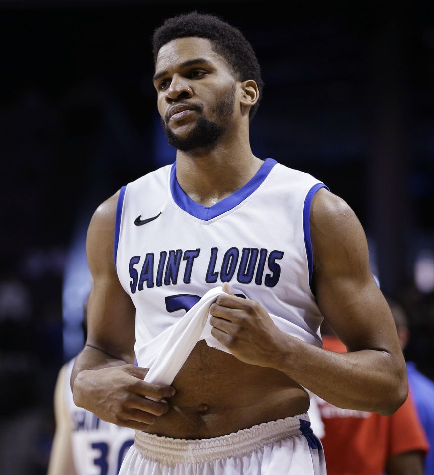 Saint Louis' Dwayne Evans reacts as he leaves the court after an NCAA college basketball game against St. Bonaventure in the quarterfinal round of the Atlantic 10 Conference tournament at the Barclays Center in New York, Friday, March 14, 2014. St. Bonaventure beat Saint Louis 71-68. (AP Photo/Seth Wenig)
