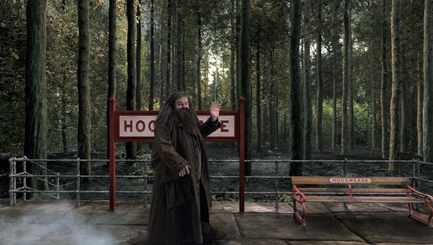 This image released by Universal Orlando shows the character Hagrid from the "Happy Potter" book and film series in a scene from the Hogwarts Express attraction that will debut this summer at Universal Orlando. The attraction will allow fans to ride the Hogwarts Express train and experience the British countryside just as the characters did in the book and movie series. (AP Photo/Universal Orlando)