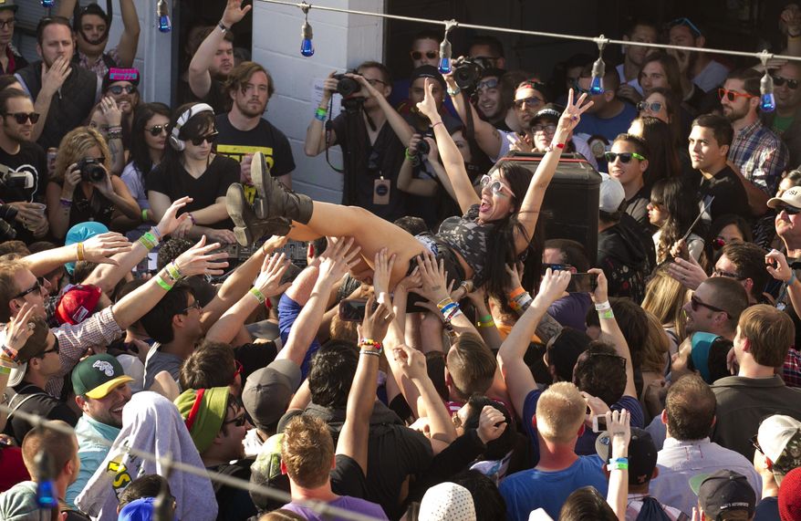 Lady Gaga performs at Stubb's in Austin, Texas, during the South by Southwest Music Festival on Thursday March 13, 2014. (AP Photo/Austin American-Statesman, Jay Janner)