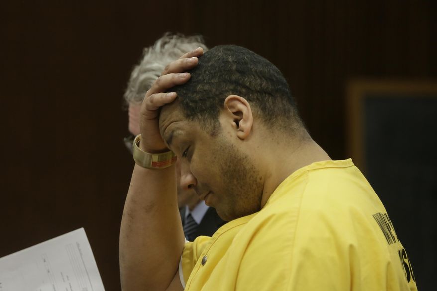 Chauncey Owens, 37, is sentenced to life by Judge Richard Skutt at Frank Murphy Hall of Justice Friday March. 14, 2014 in Detroit. Owens was convicted of killing a 17-year-old boy outside a Detroit store in 2010. (AP Photo/Detroit Free Press, Mandi Wright) DETROIT NEWS OUT; NO SALES