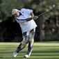 John Daly takes a divot as he hits from the seventh fairway during the second round of the Valspar Championship golf tournament at Innisbrook Friday, March 14, 2014, in Palm Harbor, Fla. (AP Photo/Chris O&#39;Meara)