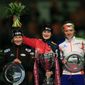 Martina Sablikova of the Czech Republic, center, holds the trophy as she poses with second place Claudia Pechstein of Germany, left, and third place Yvonne Nauta of the Netherlands, right, on the podium after the women&#39;s 3000-meter speedskating race at Thialf skating arena, Saturday, March 15, 2014, in Heerenveen, northern Netherlands. (AP Photo/Peter Dejong)