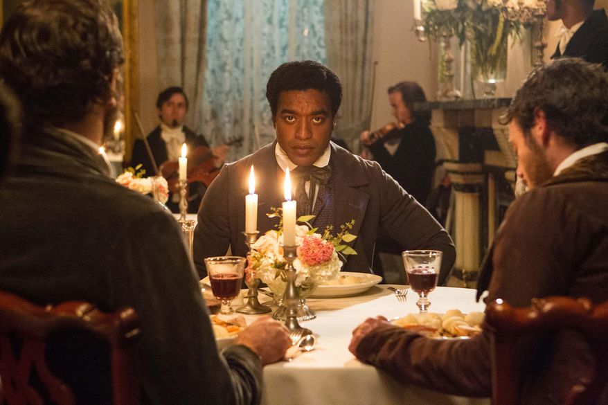 FILE- In this July 18, 2012, film publicity image released by Fox Searchlight, Chiwetel Ejiofor portrays Solomon Northup in a scene from "12 Years A Slave."  Thanks to Northup’s memoir, which the film was based on, historians know where Solomon Northup was born, where he lived and where he worked. Much of his life is part of the record but no one knows when and how he died or where he is buried. (AP Photo/Fox Searchlight Films, Jaap Buitendijk, File)