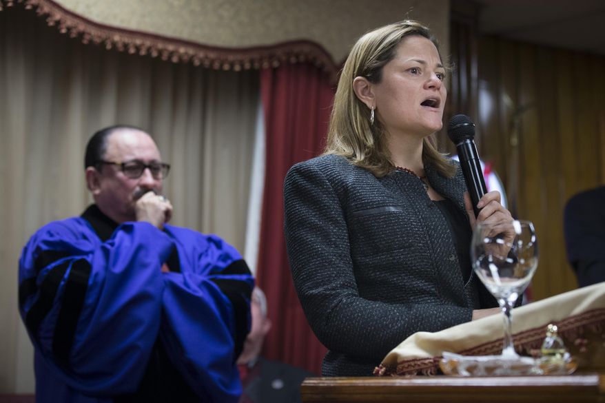 New York City Council Speaker Melissa Mark-Viverito speaks during Sunday services at the Church of God of Third Avenue as the congregation welcomed members of the Spanish Christian Church that was destroyed by Wednesday&#39;s explosion in the East Harlem neighborhood of New York, Sunday, March 16, 2014. The Spanish Christian Church had been located on the first floor of one of the destroyed buildings. On Saturday a crew at the blast site found a large Bible in the rubble and returned it to the church&#39;s pastor. (AP Photo/John Minchillo)