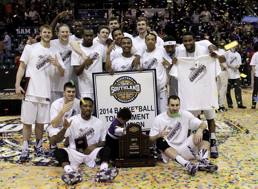 File - In this March 15, 2014, file photo, the Stephen F. Austin team celebrates with the championship trophy after an NCAA college basketball game for the Southland Conference tournament championship, in Katy, Texas. Stephen F. Austin is headed to the NCAA tournament as the first 30-win team in Southland Conference history. (AP Photo/Bob Levey, File)