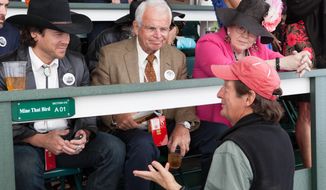 In this Oct. 18, 2012 image provided by Allied-THA, from left to right, Mark Allen, played by actor Christian Kane, Leonard ‘Doc’ Blach played by William Devane, producer and director Jim Wilson and Joanne Blach, played by Tish Rayburn-Miller, talk about a scene during filming at Churchill Downs for the movie “50-1.&amp;quot; (AP Photo/Ben Glass, Courtesy of Allied-THA)