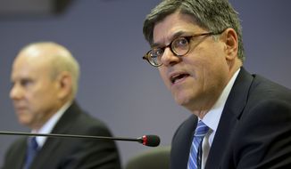 ** FILE ** U.S. Secretary of the Treasury Jack Lew, right, speaks to the press next to Brazil&#39;s Finance Minister Guido Mantega in Sao Paulo, Brazil, Monday, March 17, 2014. (AP Photo/Andre Penner)