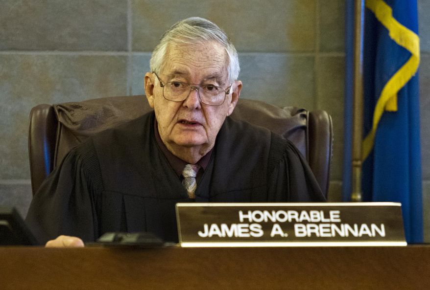 District Court Judge James A. Brennan sentences former Foothill High School teacher Amanda Brennan, who pleaded guilty to romancing a teenager, Tuesday, March 18, 2014 in Las Vegas. Brennan was sentenced Tuesday to five years of probation for an inappropriate relationship with a teenage student almost a year ago. (AP Photo/ Las Vegas Sun, L.E. Baskow)