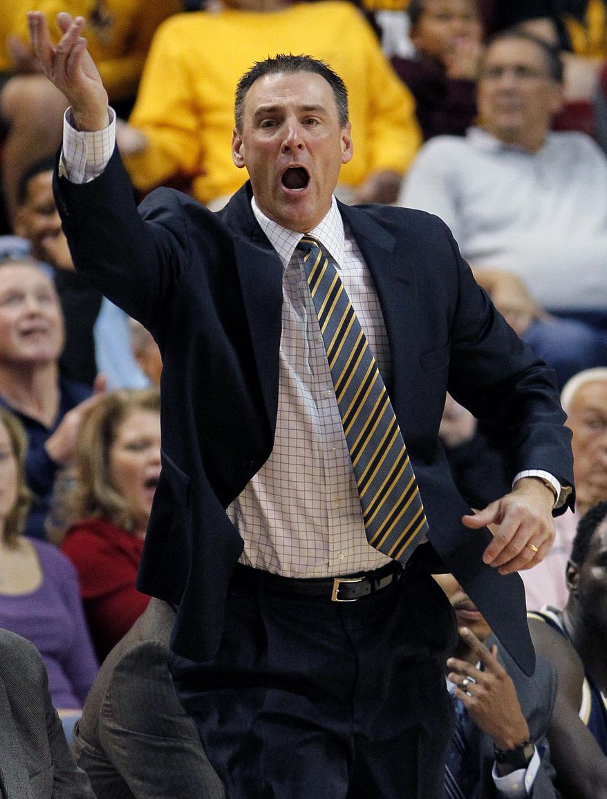 File-This Nov. 11, 2011, file photo shows Montana State head coach Brad Huse yells to his team as they play Arizona State during the first half of an NCAA college basketball in Tempe, Ariz. Huse has resigned after eight seasons. Athletic director Peter Fields says Huse resigned during a meeting between the two on Tuesday March 18, 2014 .(AP Photo/Matt York,File)