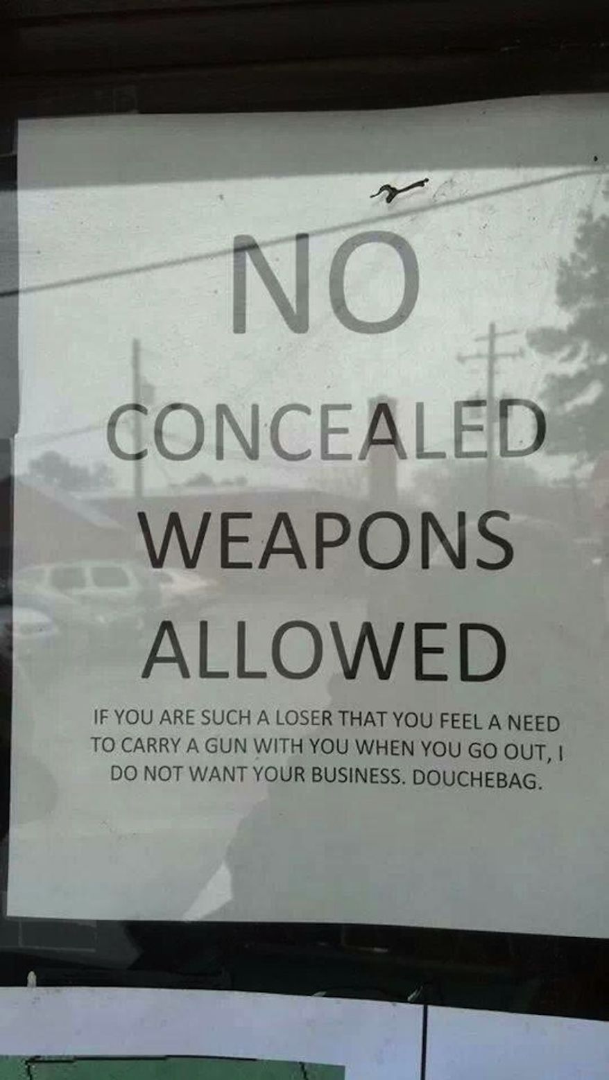 A firestorm of backlash has been mounting against a South Carolina pub that put a derogatory sign in its store window telling gun owners to keep out. (Twitter)