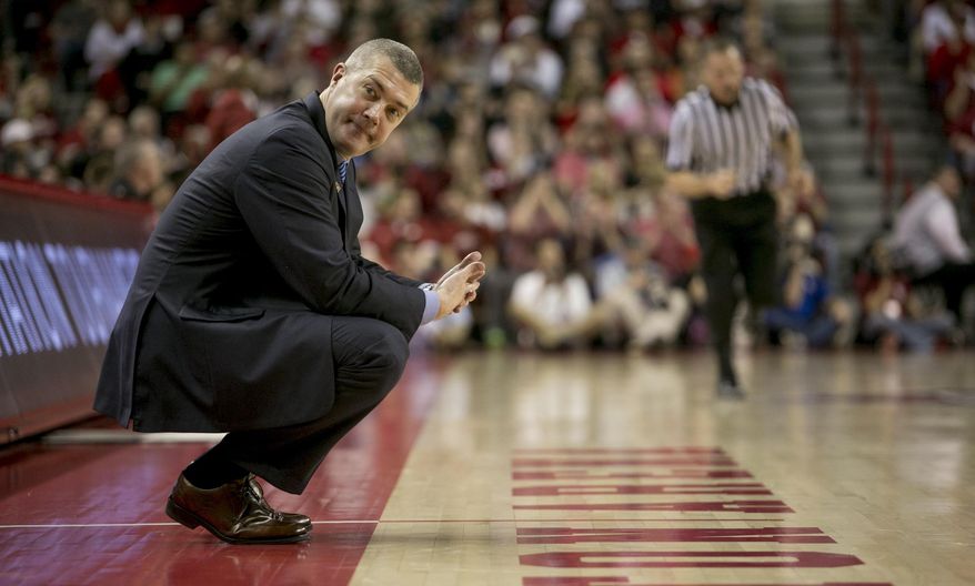 Indiana State head coach Greg Lansing looks to his bench during the second half of an opening round National Invitational Tournament NCAA college basketball game against Arkansas in Fayetteville, Ark., Tuesday, March 18, 2014. Arkansas defeated Indiana State 91-61.(AP Photo/Gareth Patterson)