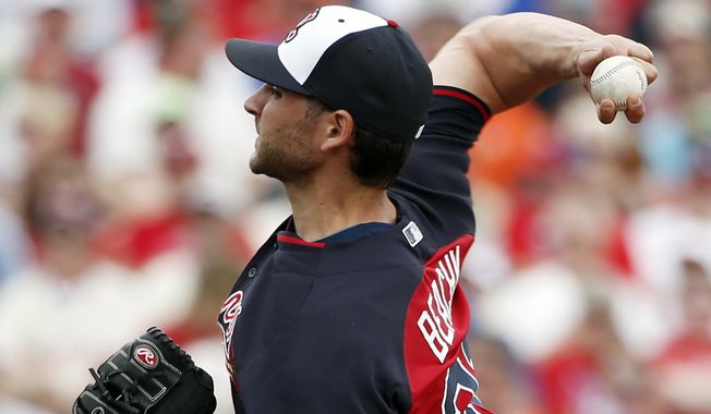 Atlanta Braves starting pitcher Brandon Beachy delivers against the Philadelphia Phillies in a spring exhibition baseball game in Clearwater, Fla., Monday, March 10, 2014. Beachy left early because of tightness around his right elbow. (AP Photo/Kathy Willens)
