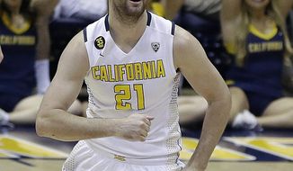 California&#39;s Jeff Powers celebrates a score against Utah Valley in the second half of an NCAA college basketball game in the NIT tournament, Wednesday, March 19, 2014, in Berkeley, Calif. (AP