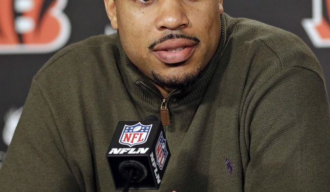 Cincinnati Bengals quarterback Jason Campbell speaks at a news conference after the NFL football team signed the free agent, Thursday, March 20, 2014, in Cincinnati. Campbell, a 10-year veteran, played with Bengals offensive coordinator Hue Jackson in Oakland. (AP Photo/Al Behrman)