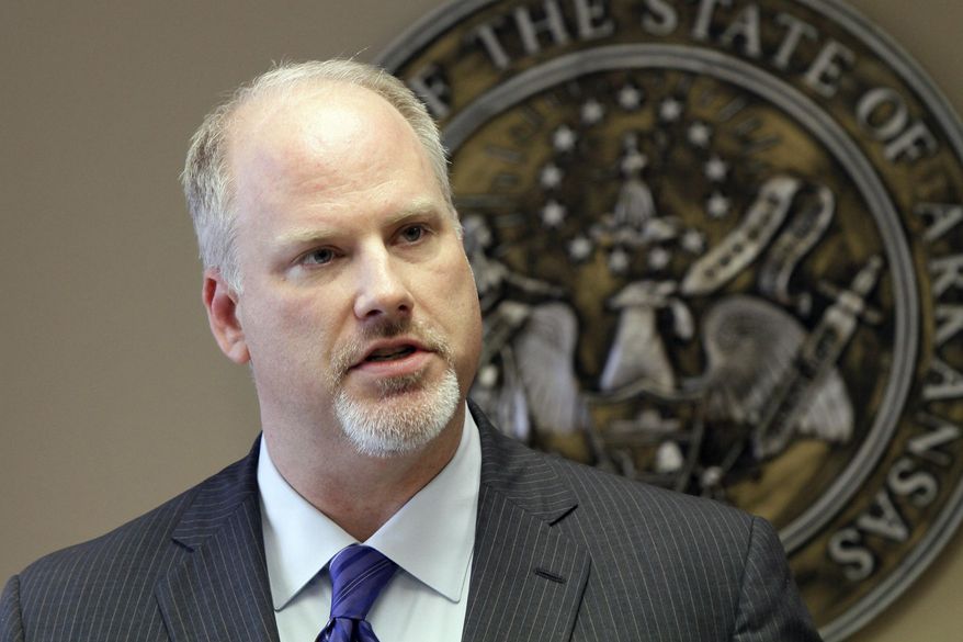 FILE - In this file photo taken Nov. 19, 2013, Arkansas Attorney General Dustin McDaniel speaks at a Little Rock, Ark., news conference. The Arkansas Supreme Court on Thursday, March 20, 2014, overturned a $1.2 billion judgment against Johnson & Johnson in a lawsuit challenging the drugmaker's marketing of an antipsychotic drug. (AP Photo/Danny Johnston, File)