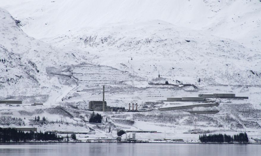 In this photo taken Feb. 26, 2014, is the terminus of the 800-mile trans-Alaska oil pipeline in Valdez, Alaska. The Exxon Valdez loaded up at the terminus and then ran aground near Bligh Reef in March 1989, spilling nearly 11 million gallons of crude in Prince William Sound. (AP Photo/Mark Thiessen)